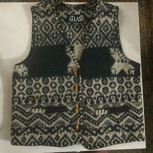 Western style vest with wood buttons.